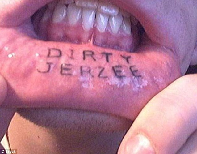 Dirty Jerzee Lettering Tattoo On Man Inner Lip