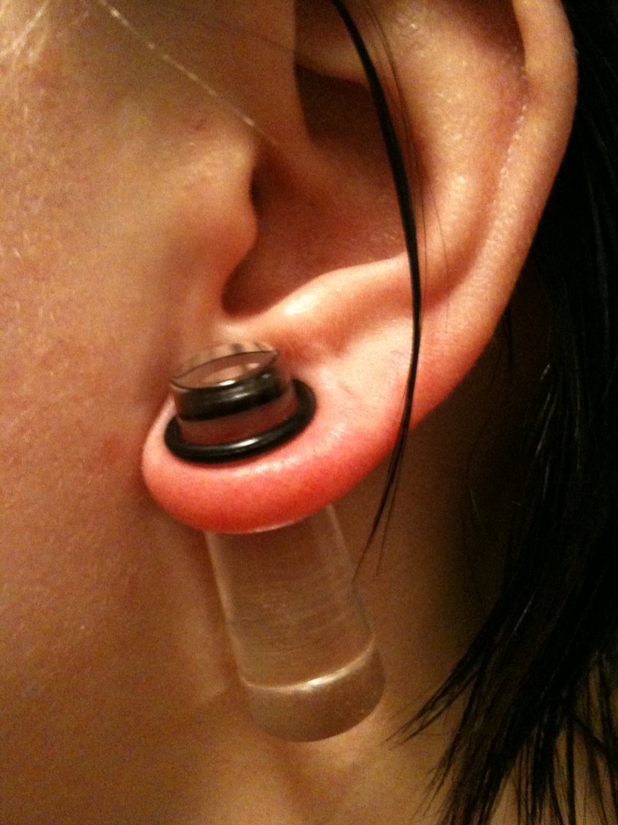 Ear Lobe Stretching With Transparent Gauge