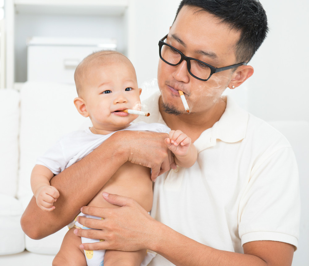 Father Smoking With Baby Funny Picture