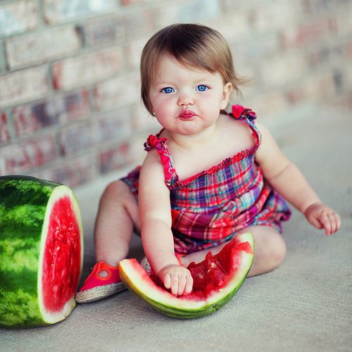 Funny Baby Girl Eating Watermelon