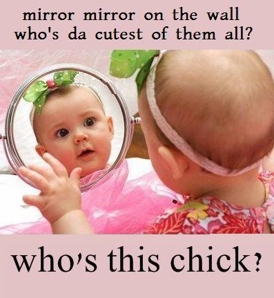 Funny Baby Girl Looking In Mirror
