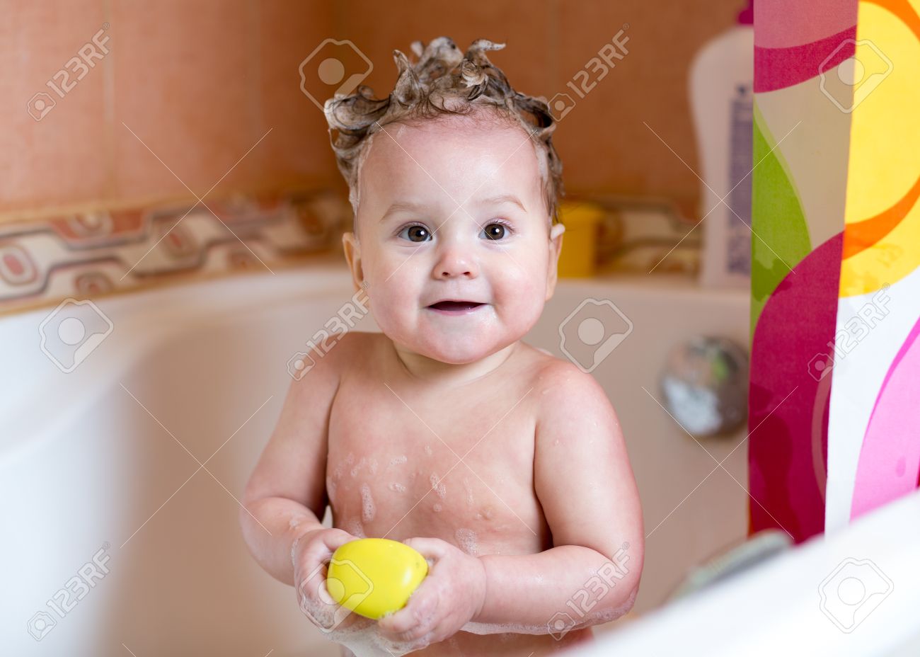 Funny Baby Girl Smiling While Bathing