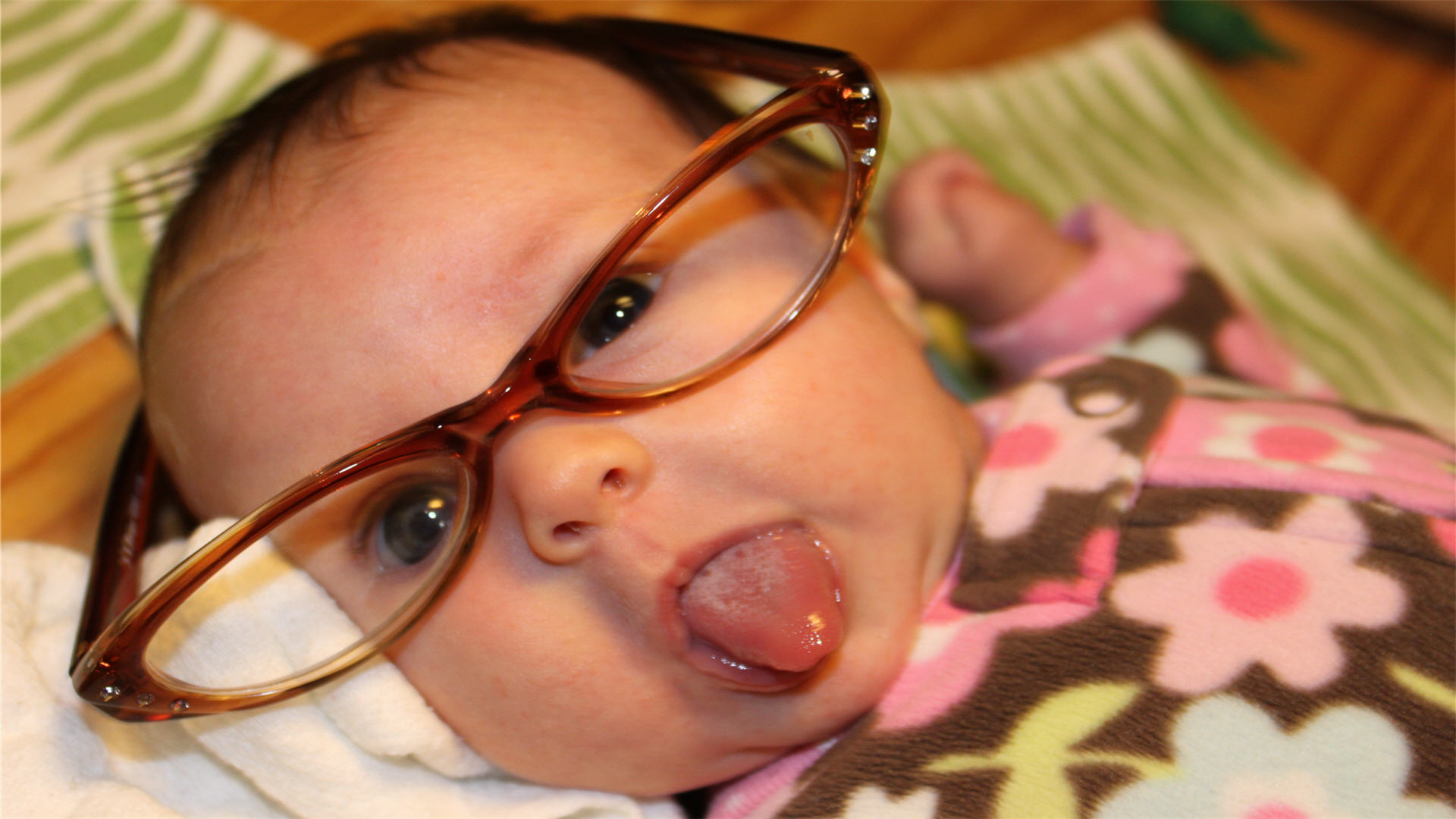 Funny Baby Girl With Large Eyeglasses