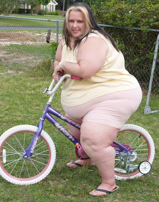 Funny Fatty Girl On Bicycle