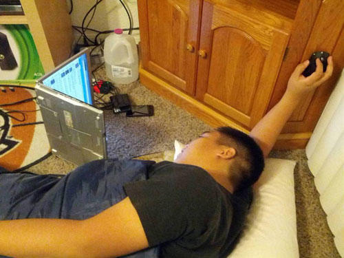 Funny Lazy Sleeping Man Using Laptop