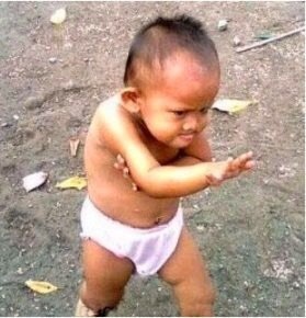 Funny Little boy In Karate Pose