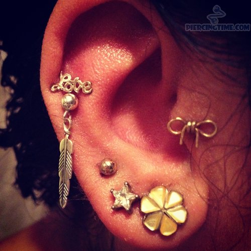 Girl Right Ear Triple Lobe And Love Feather Ear Cuff Cartilage Piercing