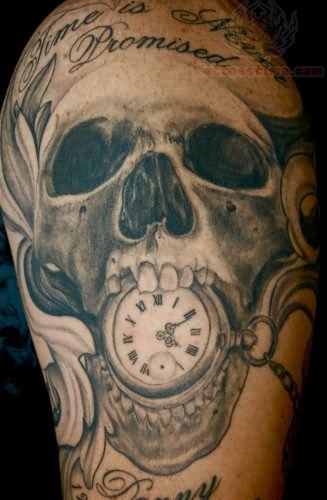 Grey Ink Pocket Watch In Skull Mouth Tattoo On Shoulder