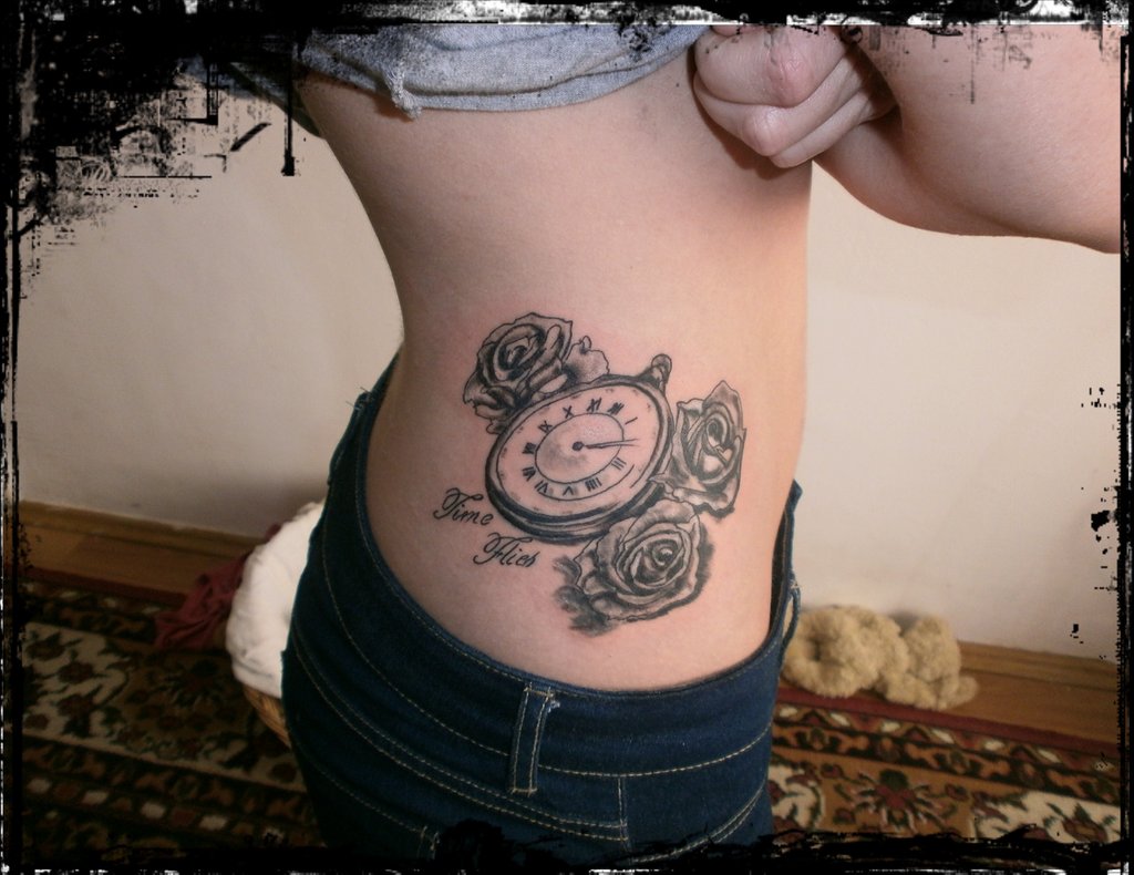 Grey Ink Pocket Watch With Roses Tattoo On Side Rib By Tatuaje Brasov
