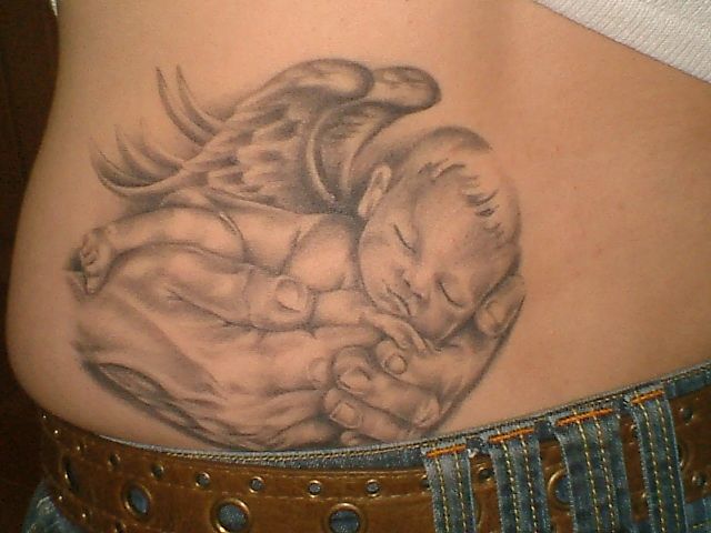 Grey Ink Sleeping Baby Angel On Hand Tattoo Design