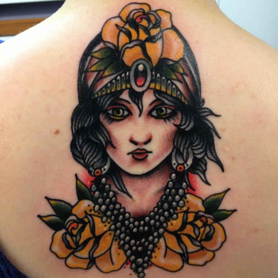 Gypsy Face With Yellow Roses Tattoo On Upper Back