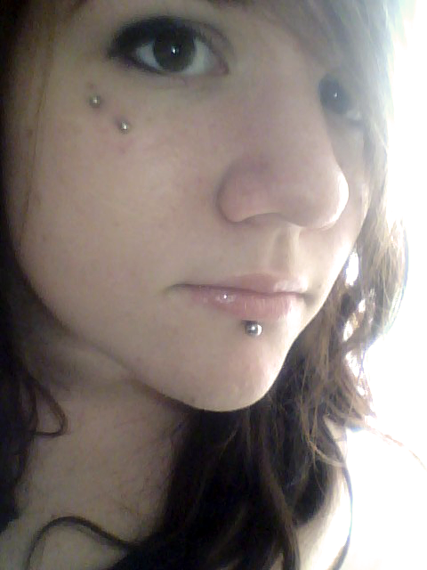 Labret Piercing With Silver Stud And Face Piercing With Silver Barbell