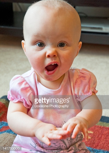 Little Baby Girl Making Funny Face