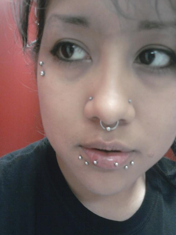 Lower Lip and Surface Face Piercing For Girls