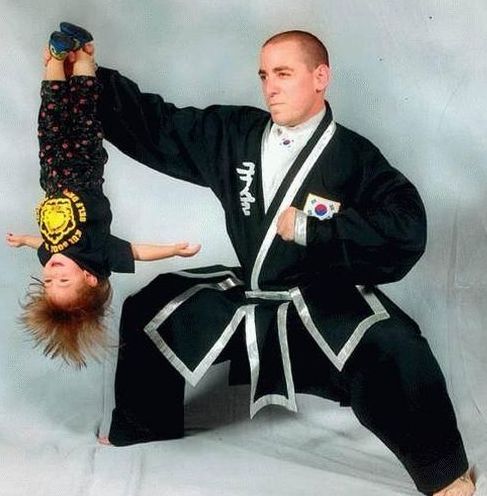 Man Hanging Small Kid Funny Karate