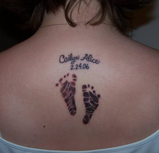 Memorial Baby Feet Print Tattoo On Girl Upper Back