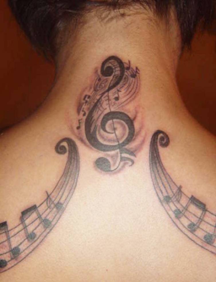 Music Notes And Violin Key Tattoo On Girl Upper back