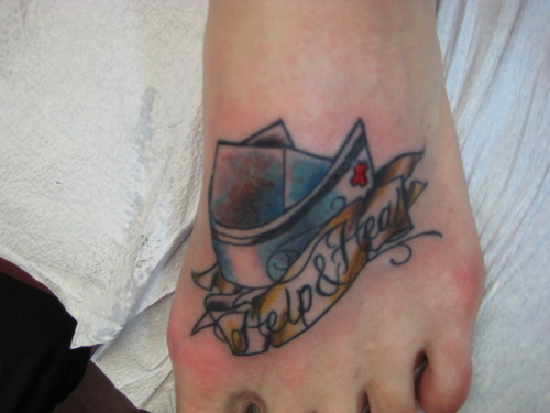 Nurse Hat With Banner Tattoo On Foot
