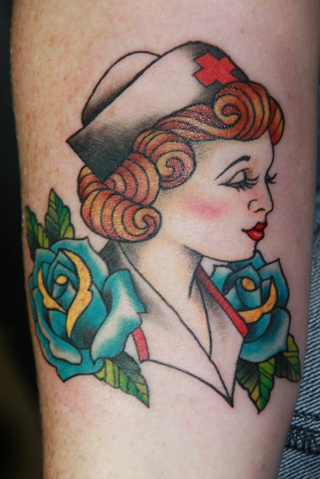 Nurse With Two Green Rose Tattoo Design