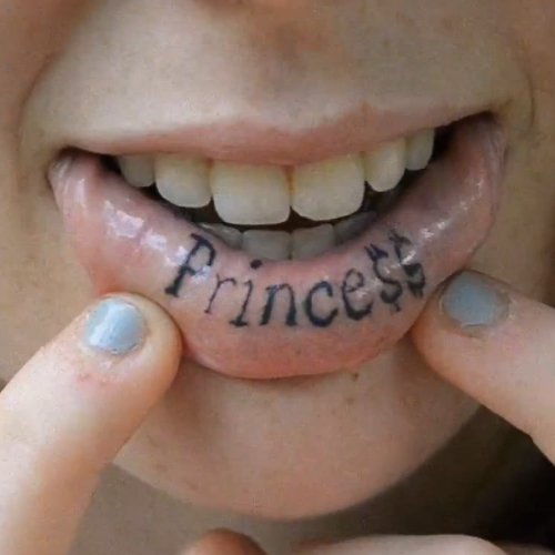 Princess Lettering Tattoo On Girl Inner Lip