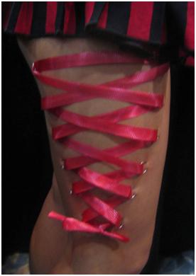 Red Ribbon Side Leg Piercing For Girls