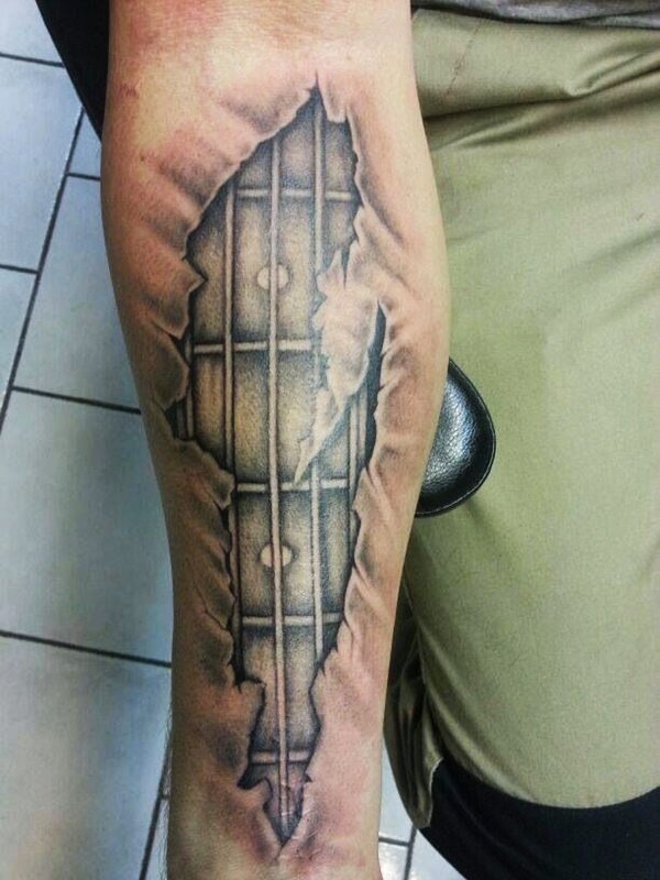 Ripped Skin Guitar Fingerboard Tattoo On Forearm