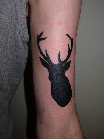 Silhouette Deer Head Tattoo On Bicep