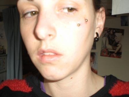 Silver Barbell Face Piercing Image