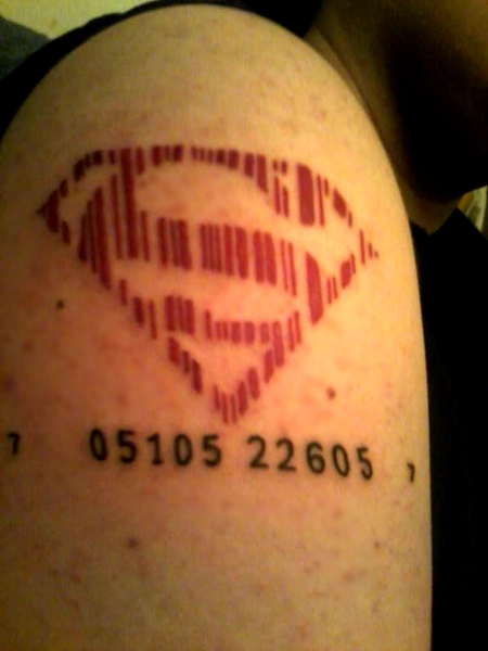 Superman Logo Barcode Tattoo On Man Shoulder By Miles Yagami