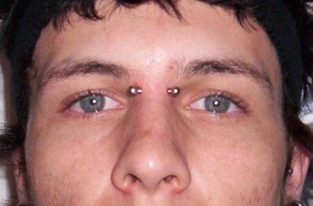 Surface Barbell Face Piercing Image