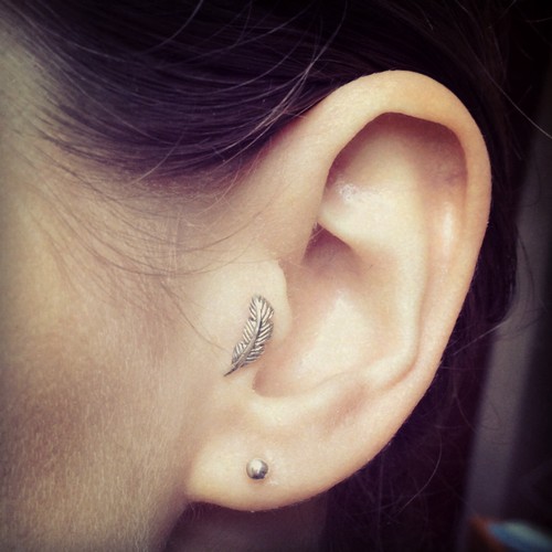Tragus Piercing With Feather Stud