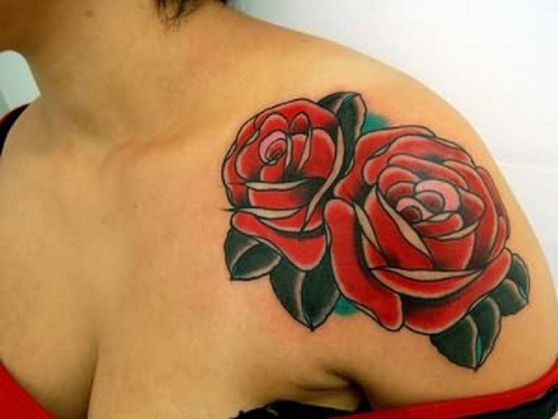 Two Red Roses Tattoo On Girl Left Front Shoulder