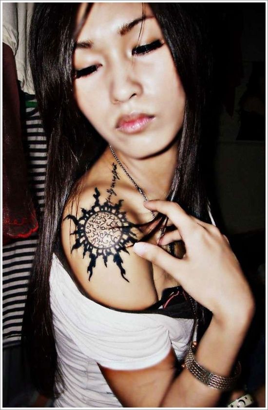 Unique Black Sun Tattoo On Women Right Shoulder
