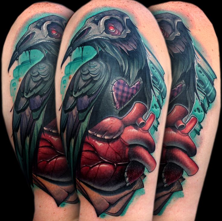 Unique Colorful Raven On Real Heart Tattoo Design
