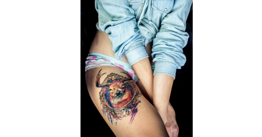 Watercolor Deer Head In Frame Tattoo On Girl Thigh