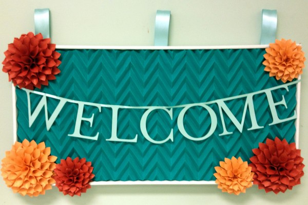 Welcome Sign With Flowers