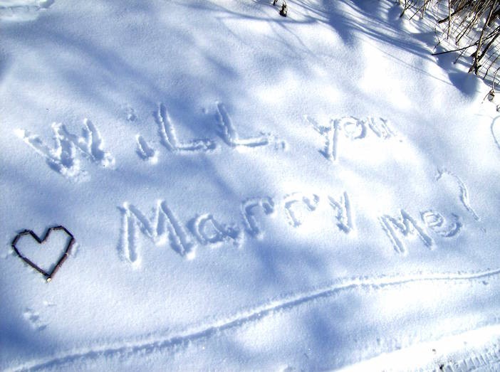 Will You Marry Me Written On Snow