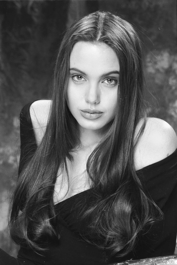 Angelina Jolie had her portrait taken twice by studio photographer Robert Kim, once at the age of 16