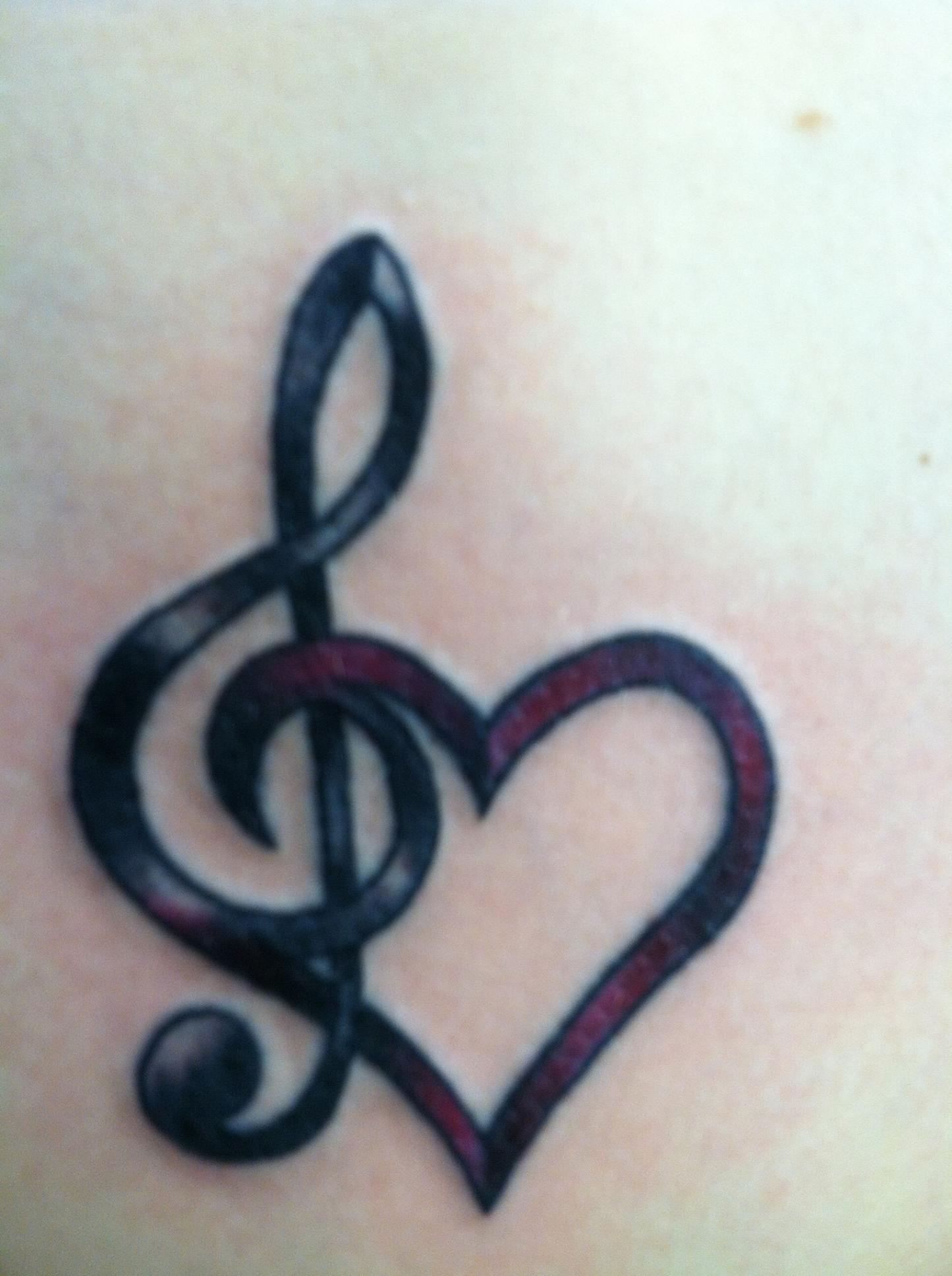 Amazing Black Ink Music Violin Key With Heart Tattoo Design