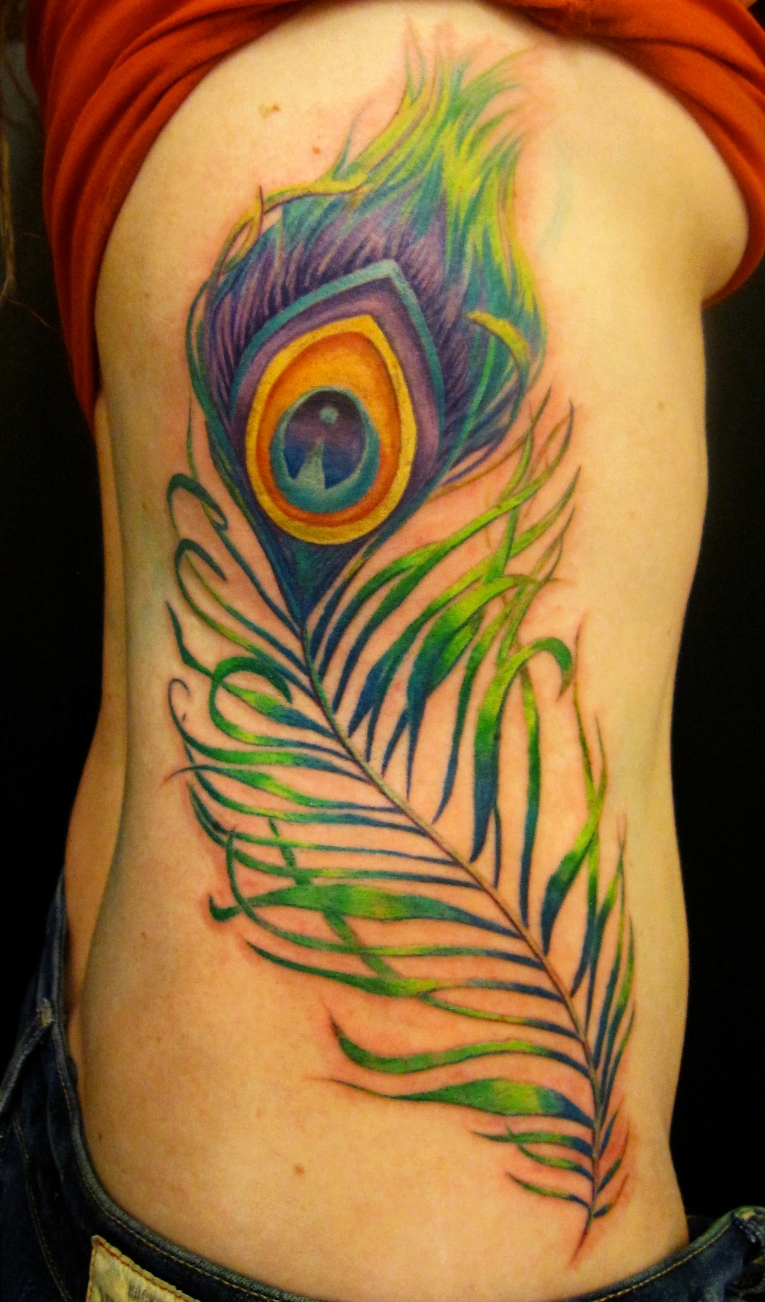 Amazing Colorful Peacock Feather Tattoo On Side Rib