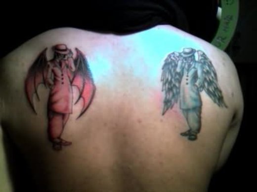 Amazing Devil And Angel Tattoo On Upper Back