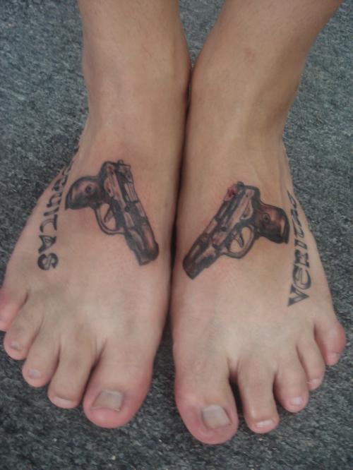Amazing Gun Tattoo On Feet