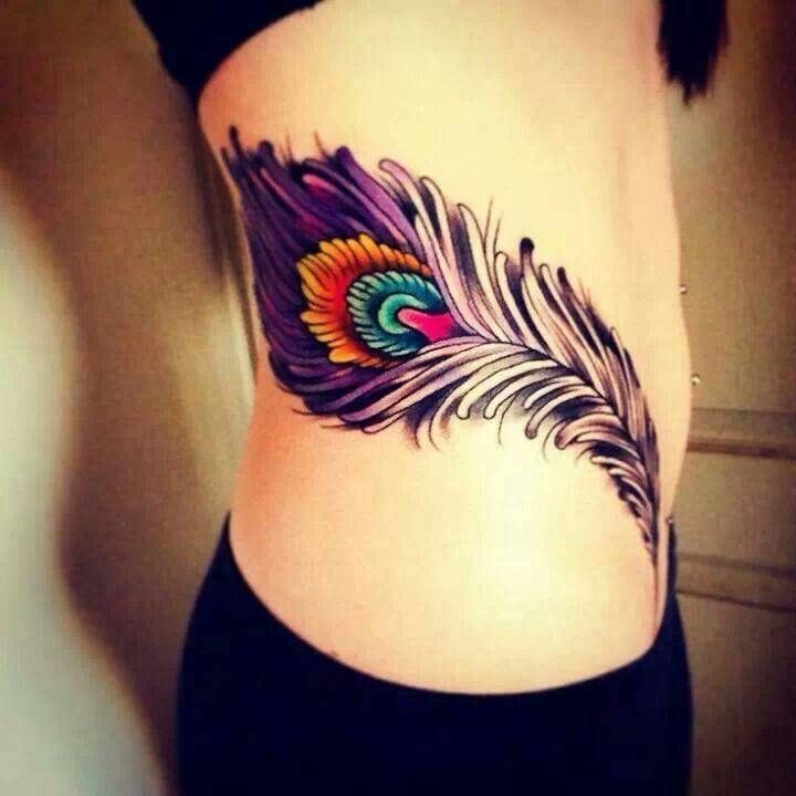 Amazing Purple Peacock Feather Tattoo On Side Rib