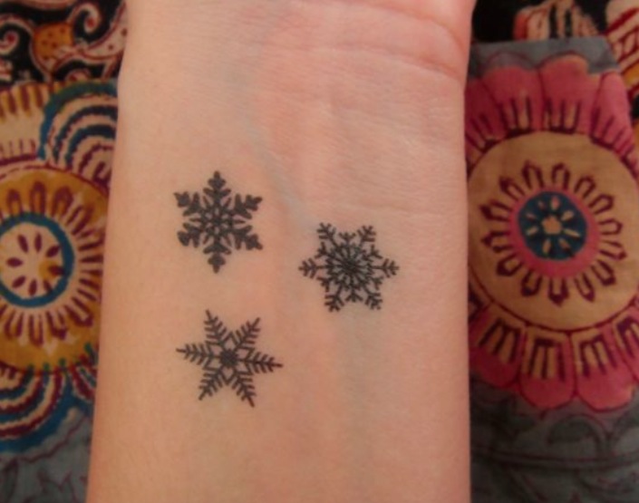 Awesome Black Three Snowflake Tattoo Design For Wrist
