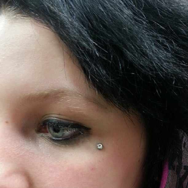 Awesome Teardrop Piercing Done by Illustrated Alex