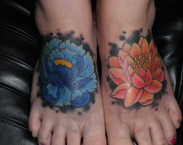 Awesome Two Lotus Flowers Tattoo On Girl Both Feet