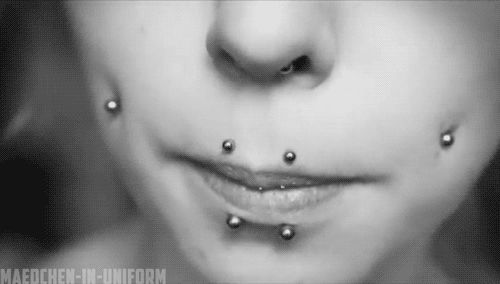 Beautiful Dimple Cheeks And Canine Bites Piercing For Girls