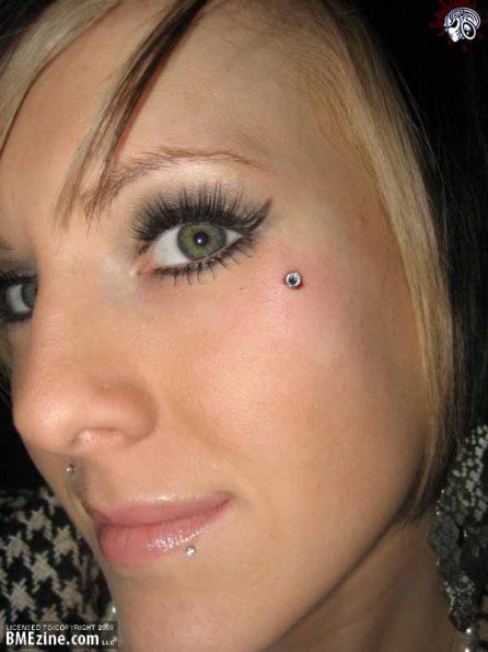 Beautiful Girl With Lower Lip and Teardrop Piercing Picture