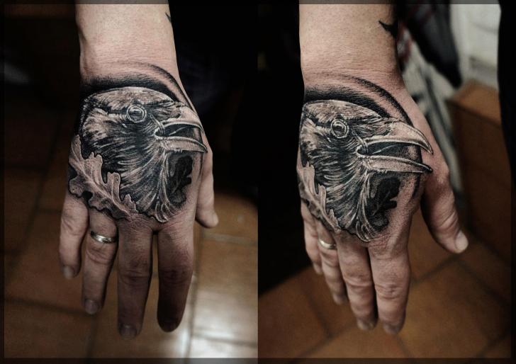 Black And Grey Crow Head Tattoo On Hand By Pavel Roch