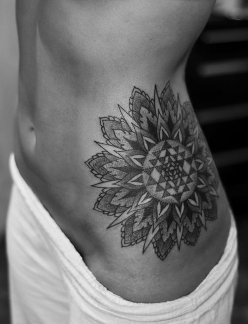 Black And Grey Mandala Design Tattoo On Side Rib